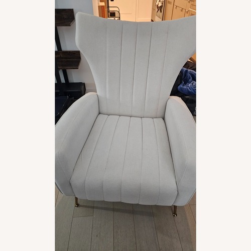 Used Wide Velvet Wingback Chair for sale on AptDeco