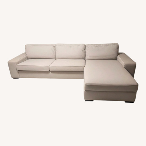 Used Grey 2 Piece Sectional Couch for sale on AptDeco