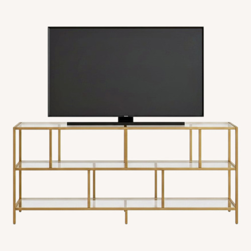 Used  TV Stand W Glass Shelves for TVs for sale on AptDeco