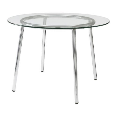 Used Round Glass Dining Table with Chrome Legs  for sale on AptDeco