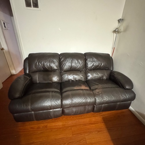 Used Black Leather Recliner Sofa for sale on AptDeco