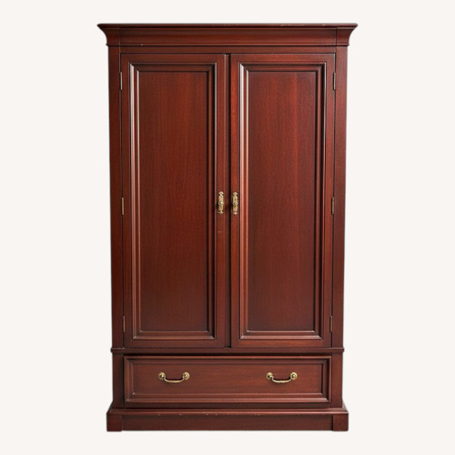 Used Dark Brown Wood Armoire by Vermont Tubbs  for sale on AptDeco