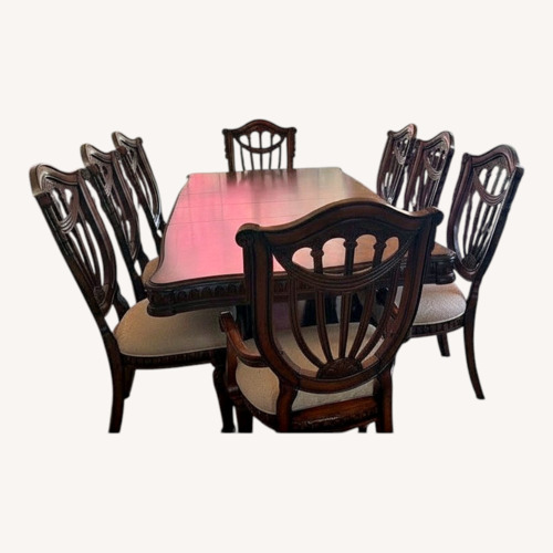 Used Solid Wood Table With 8 Chairs  for sale on AptDeco