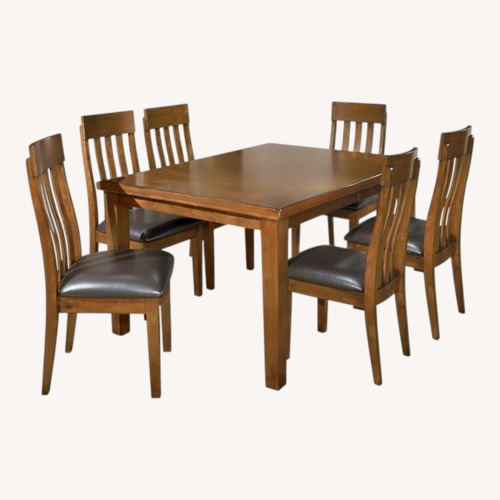 Used Ashley Furniture Dark Brown Wood Dining Set for sale on AptDeco