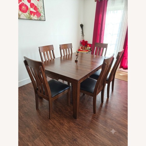 Used Ashley Furniture Dark Brown Wood Dining Set for sale on AptDeco