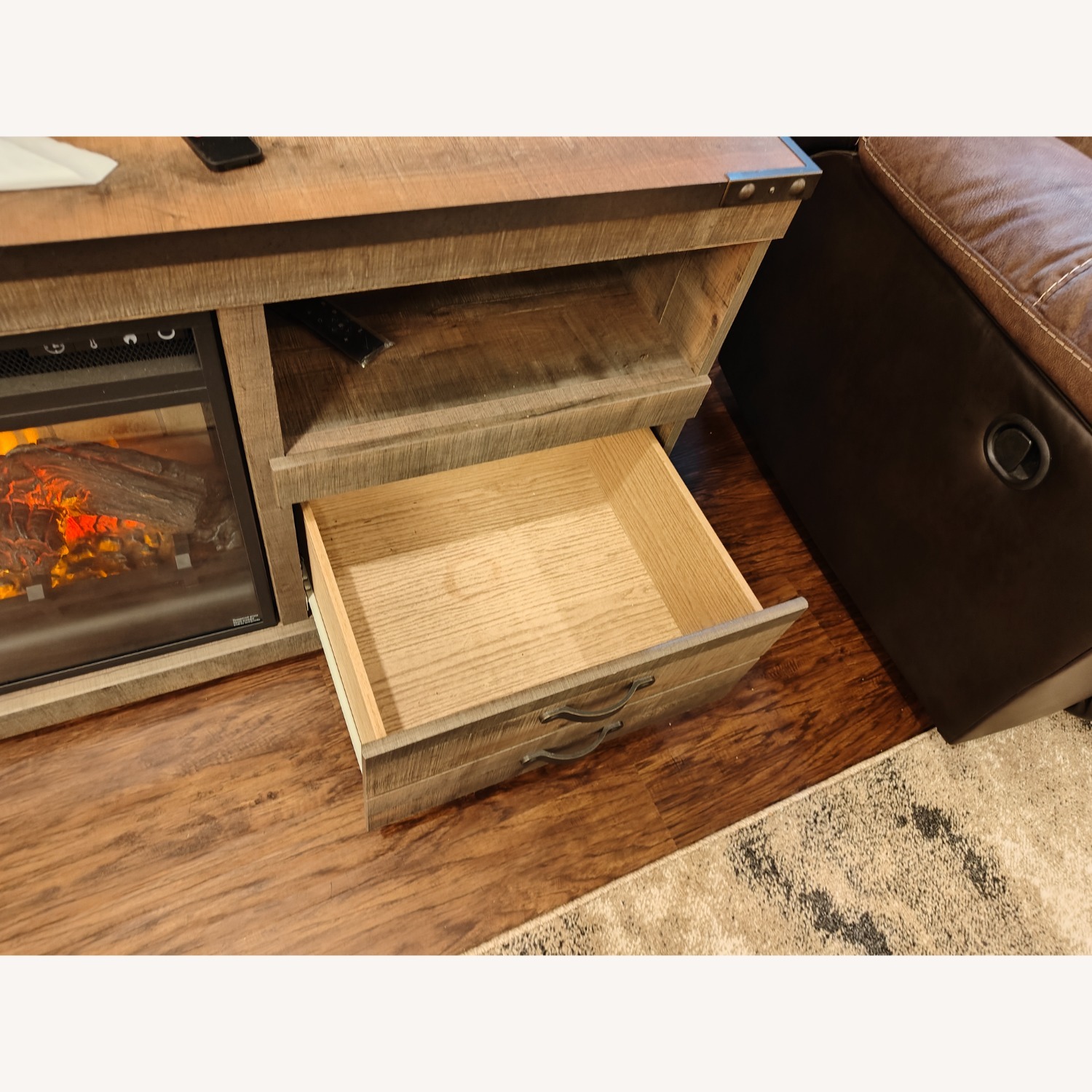 Ashley Furniture Trinell TV Stand with Electric Fireplace - image-4