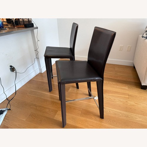 Used 2 Dark Brown Dining Chairs for sale on AptDeco