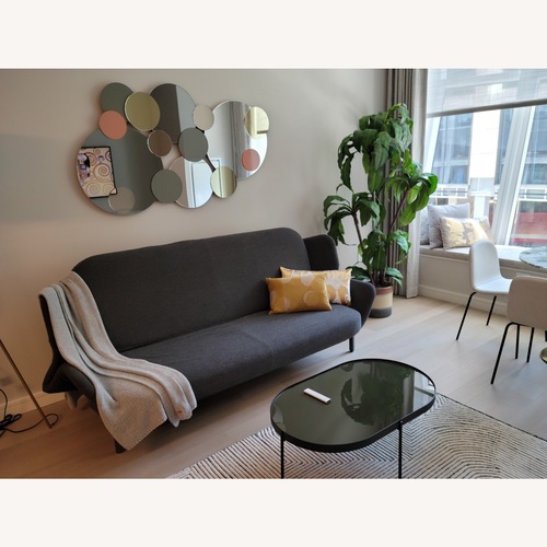 Used Ligne Roset Dark Gray Clam Sofa  for sale on AptDeco