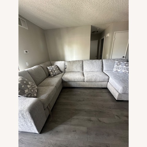 Used Ashley Furniture Rodington Light Gray 3+ Piece Sectional for sale on AptDeco