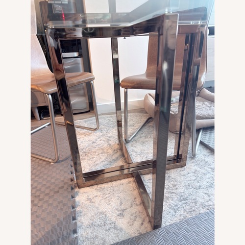 Used CB2 Silverado Chrome 47" Round Dining Table for sale on AptDeco