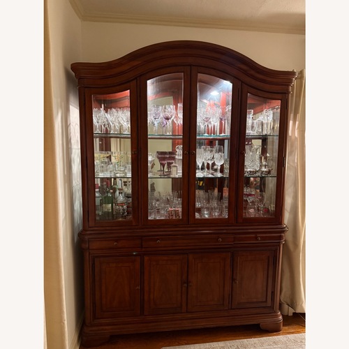 Used Light Brown Wood China Cabinet With Lights for sale on AptDeco