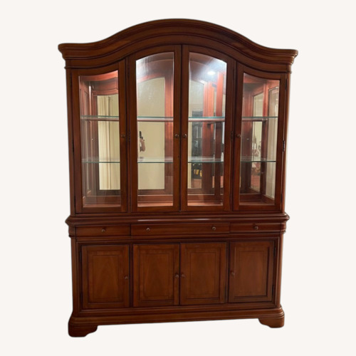 Used Light Brown Wood China Cabinet With Lights for sale on AptDeco