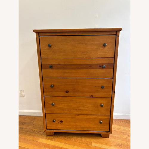 Used Progressive Furniture 5-Drawer Wood Dresser for sale on AptDeco