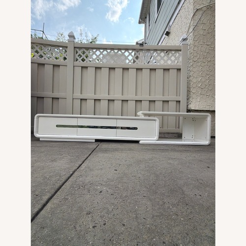 Used Modern White Extendable TV Stand (Gloss Finish) for sale on AptDeco