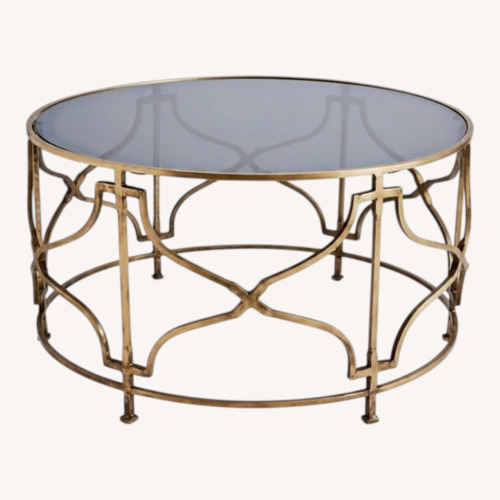 Used Bradley Glass Top Coffee Table for sale on AptDeco