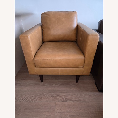 Used Rivet Light Brown Leather Armchair for sale on AptDeco