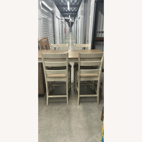 Used Ashley Furniture Natural Wood Dining Set for sale on AptDeco