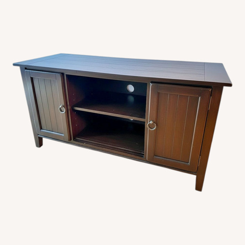 Used Dark Brown Wood Entertainment Center for sale on AptDeco