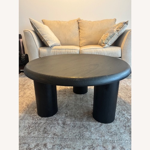 Used Black Wood Coffee Table for sale on AptDeco