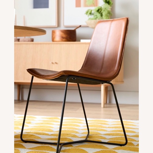 Used West Elm Slope Leather Dining Chair for sale on AptDeco