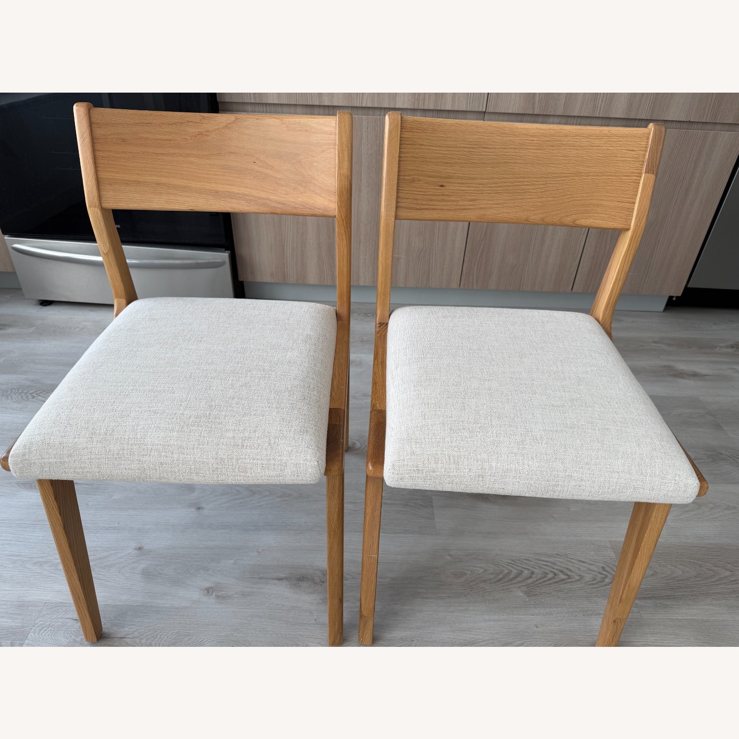 Crate & Barrel Lakin White Wood Dining Chairs - image-2