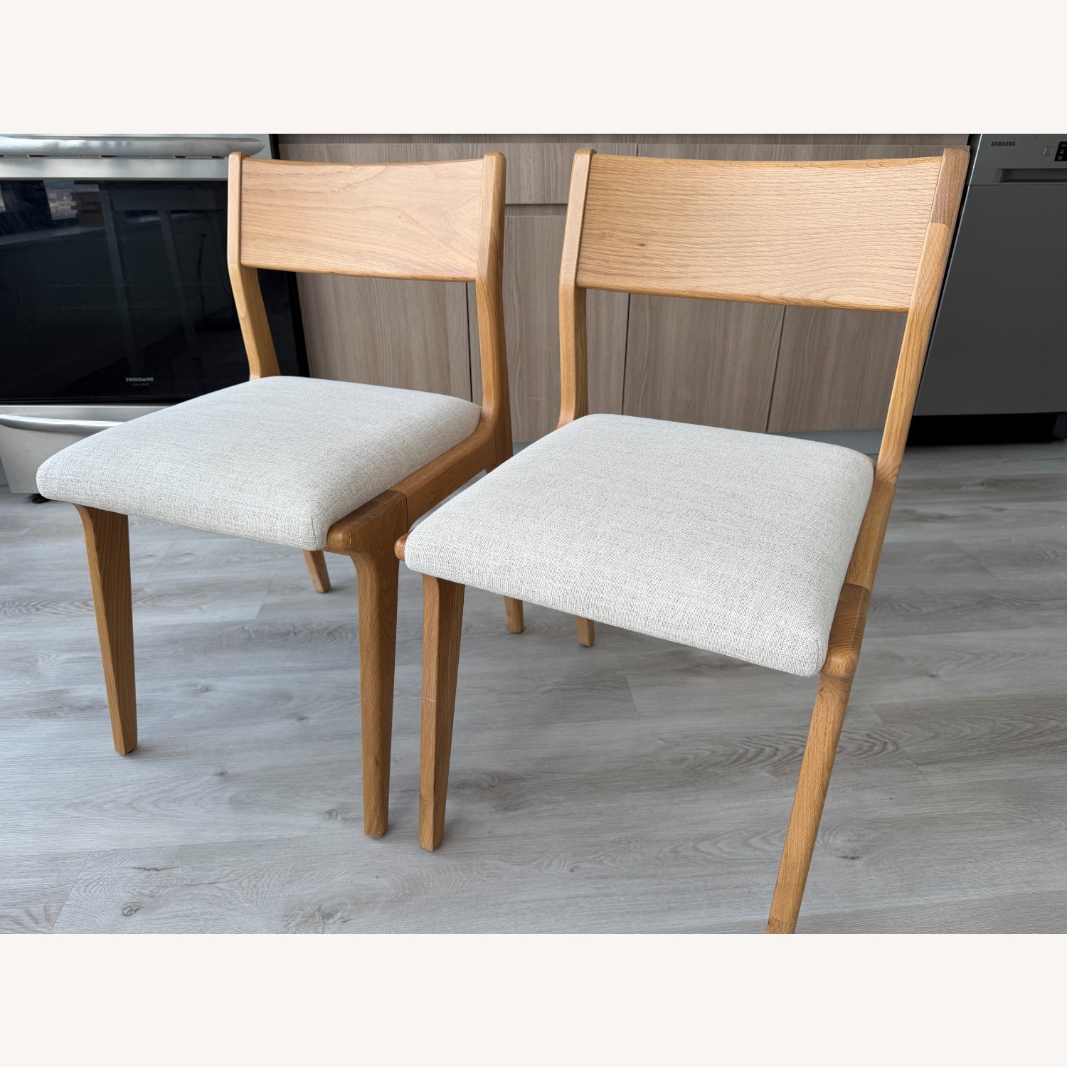 Crate & Barrel Lakin White Wood Dining Chairs - image-3