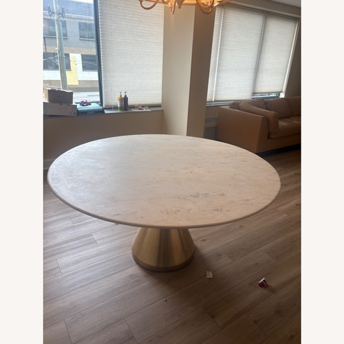 Used West Elm Silhouette Pedestal Oval Dining Table (60")  for sale on AptDeco