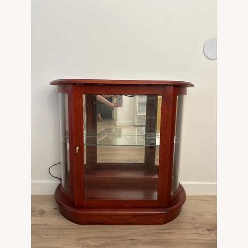 Used Bombay Red Curio Cabinet W Lights for sale on AptDeco