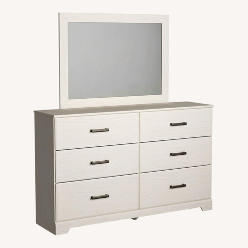 Used Ashley Furniture Stelsie 6 Drawer Dresser and Mirror for sale on AptDeco