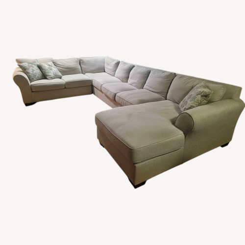 Used Ashley Furniture Natural 3+ Piece Sectional for sale on AptDeco