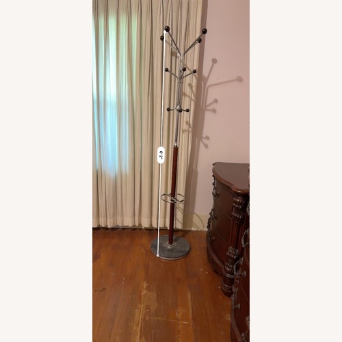 Used Vintage/Antique Metal and Wood Clothes Hanger for sale on AptDeco
