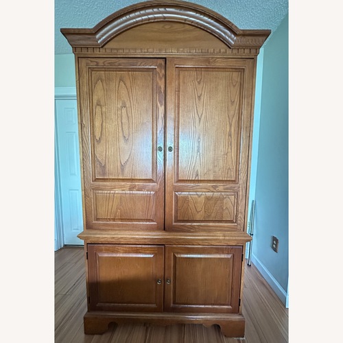 Used Natural Wood Armoire for sale on AptDeco
