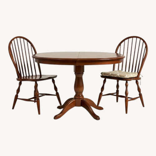 Used Dark Brown Dining Table and 3 Chairs for sale on AptDeco