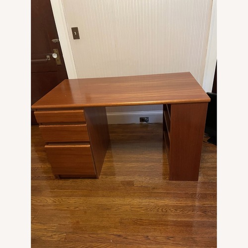 Used Scandinavian Designs Light Brown Wood Desk for sale on AptDeco
