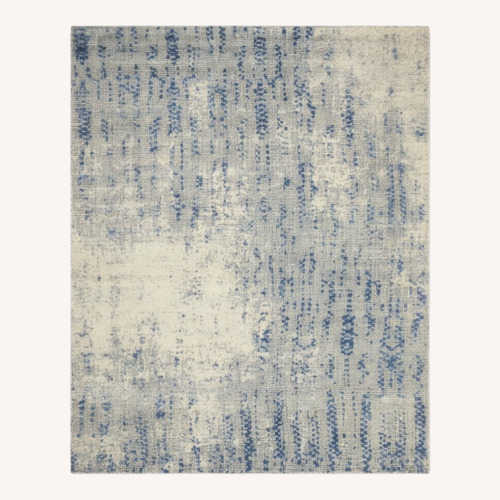 Used West Elm Distressed Foliage Rug 5' x 8' for sale on AptDeco