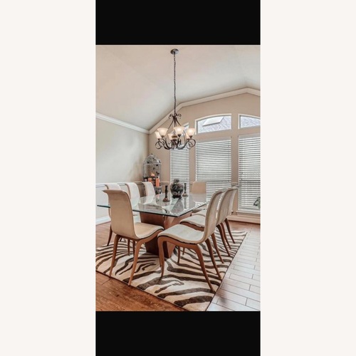 Used Cantoni Dining Table and Chairs for sale on AptDeco