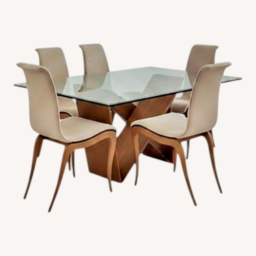 Used Cantoni Dining Table and Chairs for sale on AptDeco