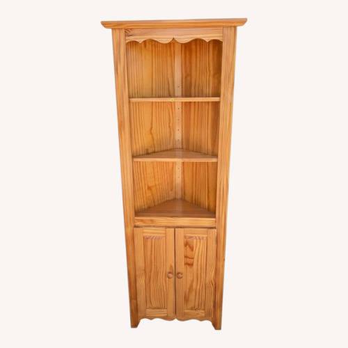 Used Brazilian Solid Pine Wood Corner Curio Cabinet for sale on AptDeco