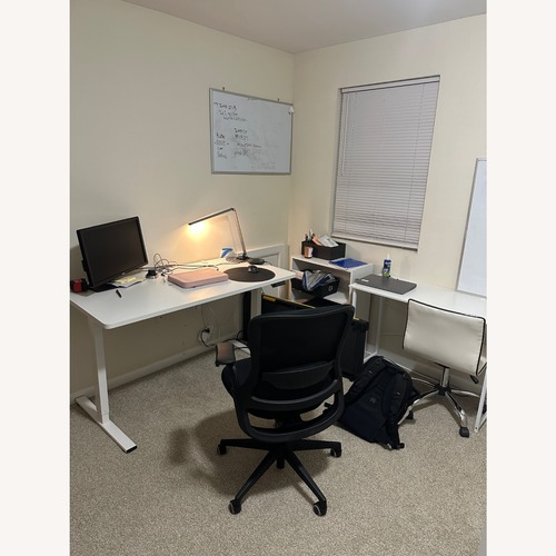 Used FLEXISPOT EN2 55"x28" Whole-Piece Standing Desk for sale on AptDeco