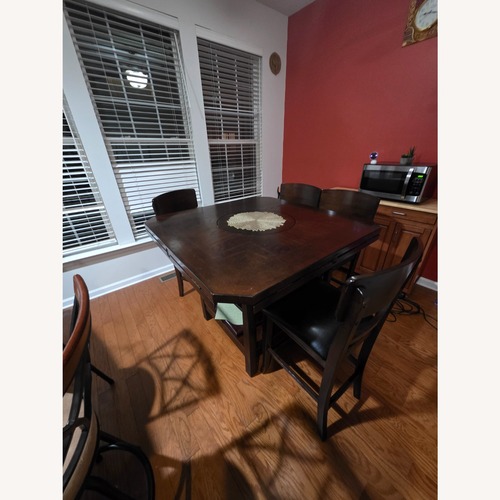 Used Extendable Wooden Dining Table + Storage for sale on AptDeco