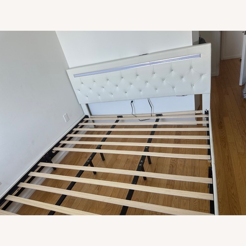 Used King Bed Frame with LED Lights, Charging Station for sale on AptDeco