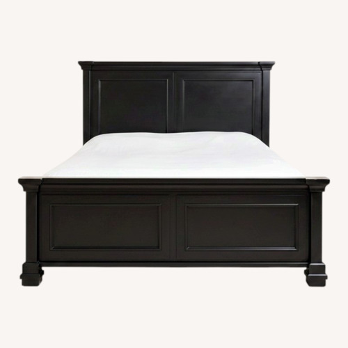 Used Black Wood Queen Panel Bed for sale on AptDeco