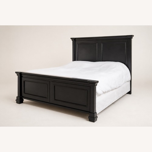 Used Black Wood Queen Panel Bed for sale on AptDeco