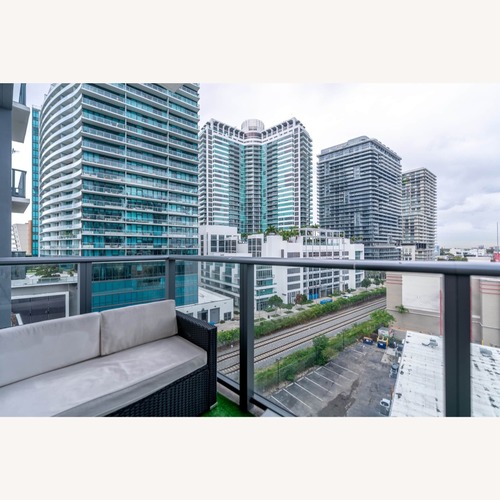 Used Black Rattan Balcony Set for sale on AptDeco