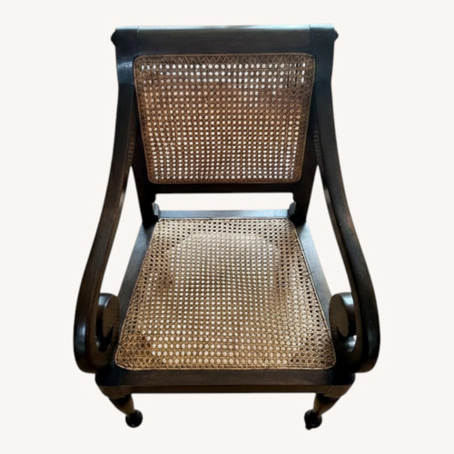 Used Vintage/Antique Dark Brown Wood Armchair for sale on AptDeco