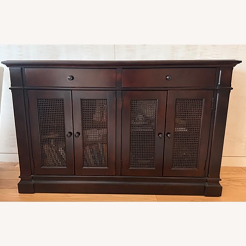 Used Mahogany-finished, rattan paneled Credenza for sale on AptDeco