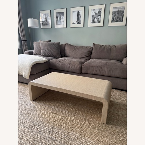 Used West Elm Solstice Painted Raffia Low Coffee Table (44") for sale on AptDeco