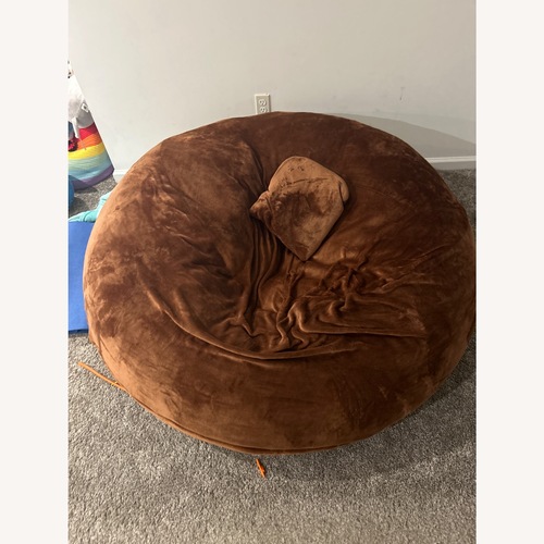Used Dark Brown Fabric Play Chair for sale on AptDeco