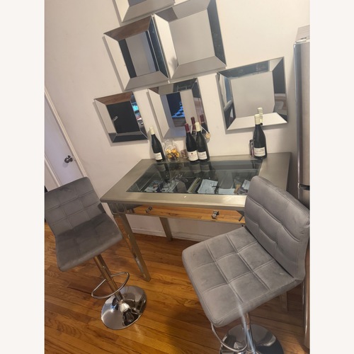 Used Transparent Glass Top Bar with 2 Grey Barstools for sale on AptDeco