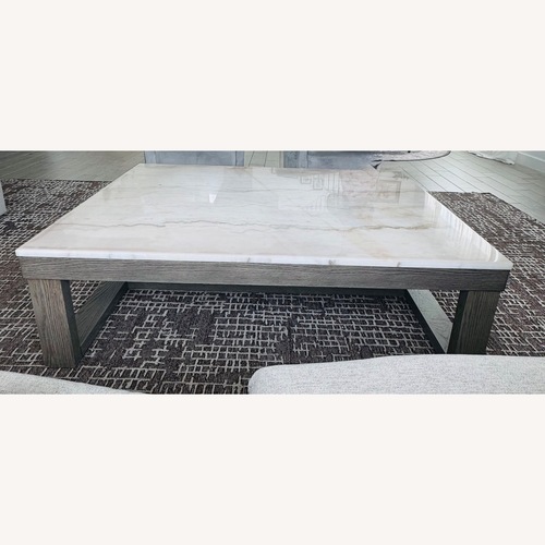 Used Ashley Furniture Loyaska White Marble Coffee Table for sale on AptDeco